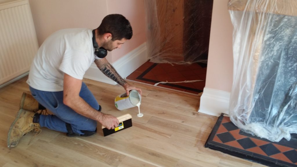 Refinishing a wood floor with oil