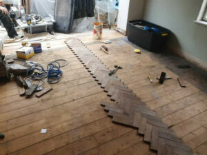 reclaimed herringbone parquet floor image 1